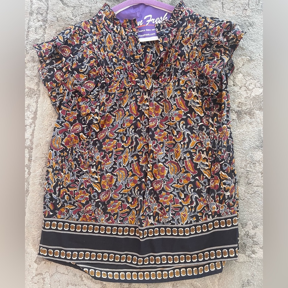 Multi colored ruffle shoulder boho top.  Worn twice